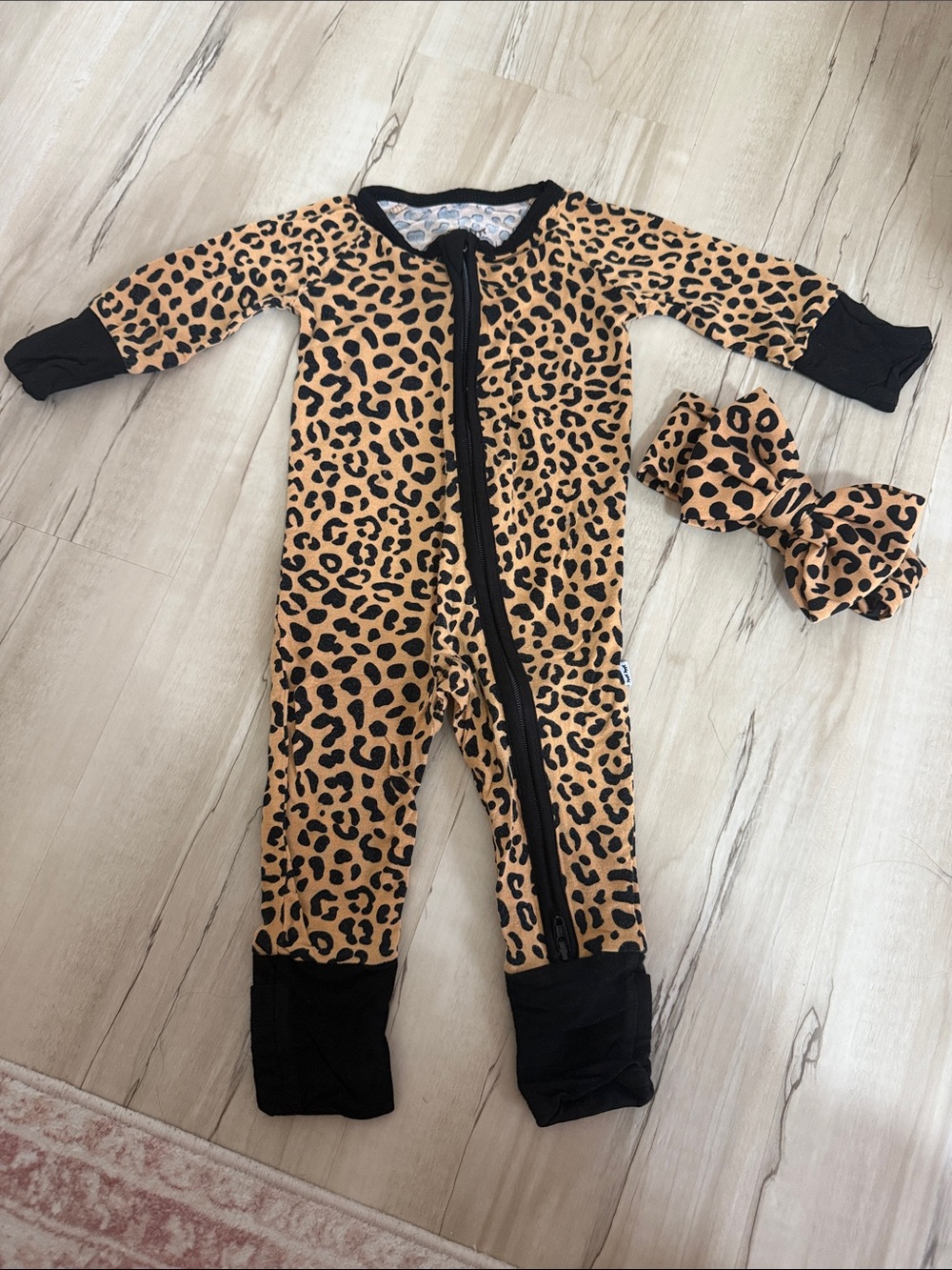 Little Sleepies Leopard Print Footie Pajamas in Tan & Black with Bow